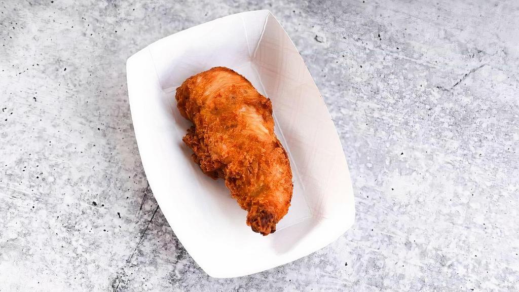 One Nashville Chicken Tender · Hand-battered chicken tender, fried to order and tossed in our spicy Nashville Hot seasoning, with your choice of dipping sauce