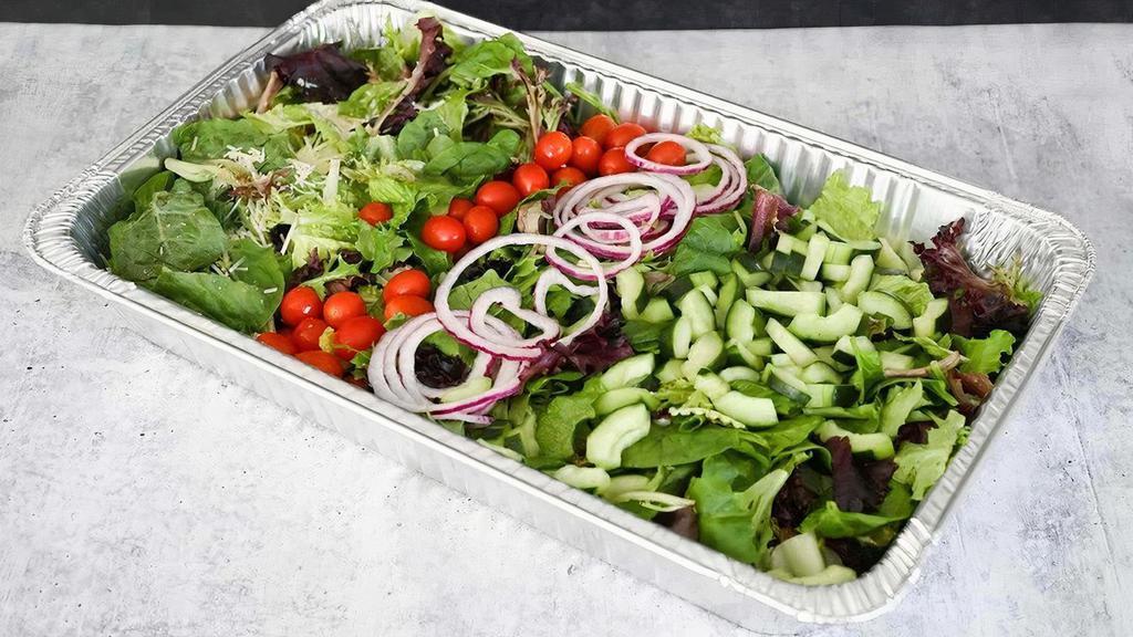 Jumbo Party Salad · Feeds 20–24 folks: spring mix, cucumbers, tomatoes, cheese, and onions