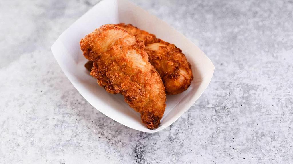 Kids Chicken Tenders · Chicken tenders marinated in buttermilk, hand-battered, fried to order, and served with one kid's-sized side and drink