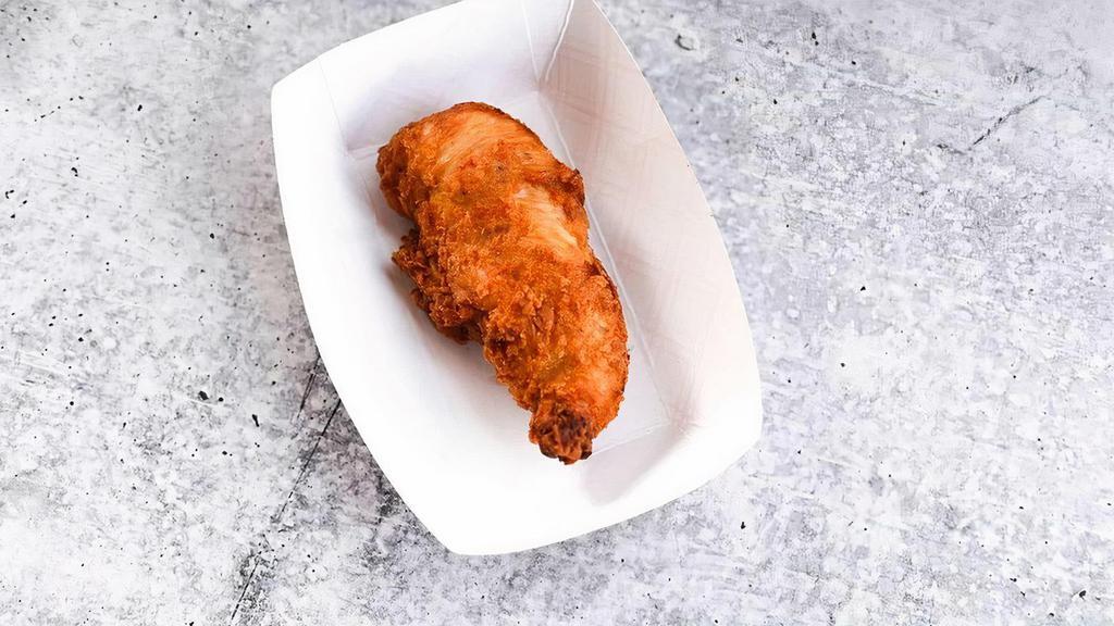 Individual Chicken Tender · Marinated in a bit of buttermilk, spiced with our signature dry rub, hand-battered, and fried to order