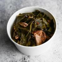 Collard Greens With Pork · Fresh collard greens, pulled pork and bacon, vinegar and a dash of hot sauce