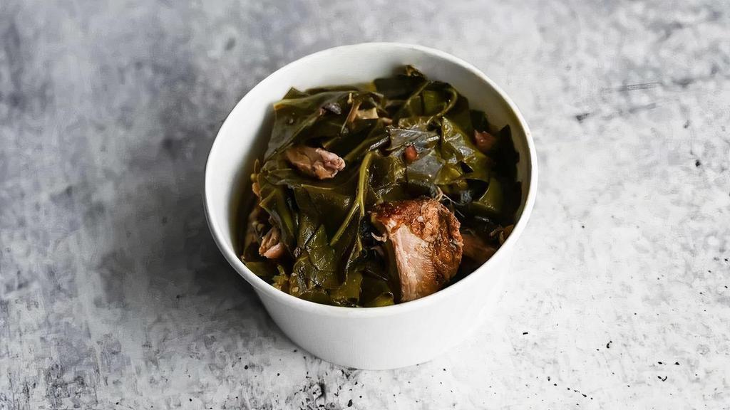 Collard Greens With Pork · Fresh collard greens, pulled pork and bacon, vinegar and a dash of hot sauce