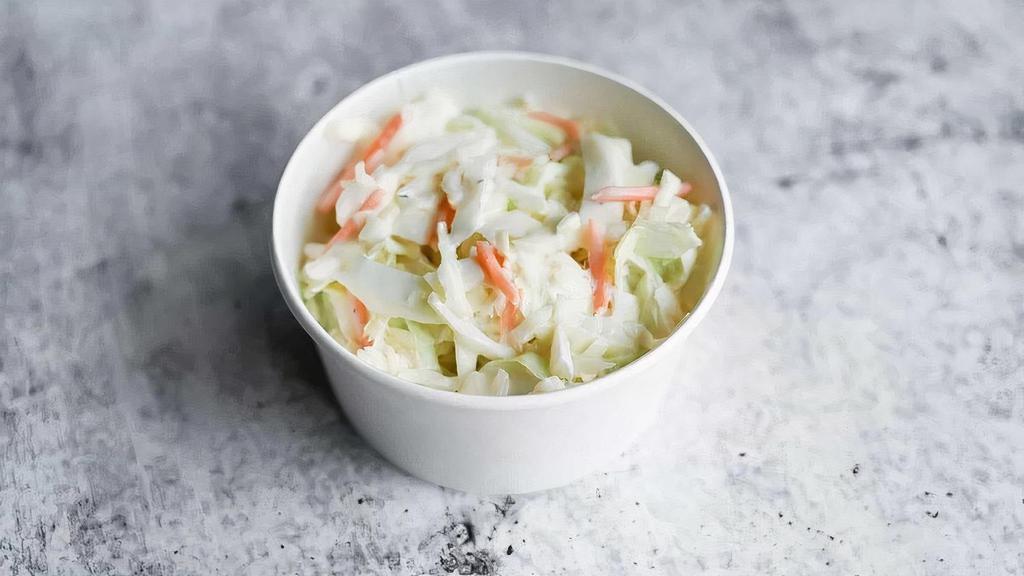 Creamy Slaw · A homemade coleslaw in a mayo and vinegar–based dressing