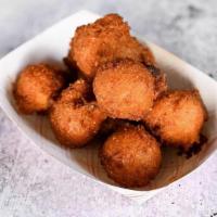 Hush Puppies · Crispy on the outside, soft on the inside, and hand-dipped fresh, right when you get here (p...