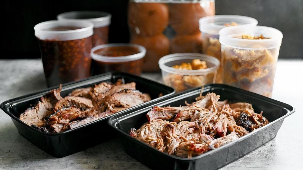 Feeds 14-16 · Your choice of two meats (2.5 pounds each) and two sides (2.5 quarts each), buns, and sauce (and we'll throw in plates, napkins, and utensils if you need 'em)