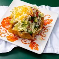 Taco Salad · Flour tortilla bowl with your choice of ground beef, grilled chicken or grilled steak, with ...