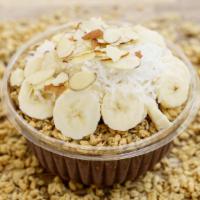 Almond Acai Bowl · Organic acai, banana, almond butter, almond milk, omega-3 and coconut palm sugar. Topped wit...