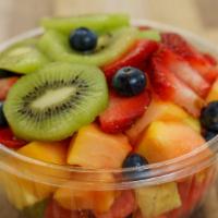 Seven Fruit Bowl · Strawberry, pineapple, banana, watermelon, blueberry, kiwi and grapes.