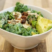 Orange Kale Salad · Kale, avocado, figs, hemp hearts, almonds and chia seeds dressed with fresh orange juice, ol...