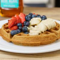 High Protein Whole Wheat Waffle · Made with Ten fruits' almond milk, isopure whey protein. Topped with blueberries, strawberri...
