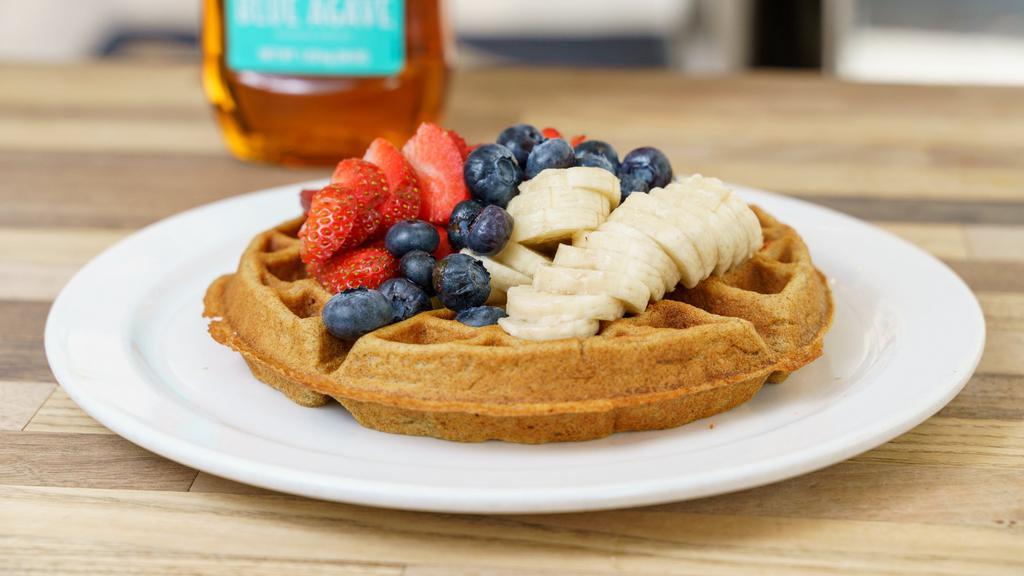 High Protein Whole Wheat Waffle · Made with Ten fruits' almond milk, isopure whey protein. Topped with blueberries, strawberries, banana and agave.