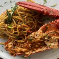 House Spaghetti Main Lobster · Clams, mussels, calamari and shrimp cooked with light marinara sauce