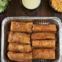 Chimichanga Family Meal · Feeds 6 - 8 people 4 beef chimichangas 4 chicken chimichangas Rice, Beans, Large Cheese Dip,...