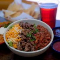 Bowls · Your choice of chicken or steak with rice, whole pinto beans, pico de gallo and your choice ...