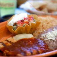 Pollo Ranchero · 8oz. grilled chicken breast smothered with Chihuahua cheese and ranchero sauce. Served with ...