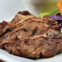 Tablitas · Grilled USDA Prime Bone in Filets. Served with a fresh mixed salad topped
