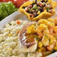 Vallarta Mango Fish · Fresh grilled Tilapia topped with shrimp and a mango sauce. Served over a bed of white rice ...