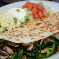 Spinach Quesadilla. · Cheese, grilled onions, bell peppers, mushrooms, spinach, tomatoes.