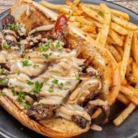 Philly Chicken Sandwich · Philly cheese sandwich melted white American cheese, sautéed peppers and onions, philly driz...