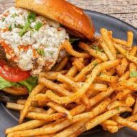 Buff Blue Burger · Angus beef patty, lettuce, tomato, onion, buffalo sauce, blue cheese crumbles, served with y...