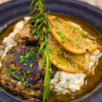 Roasted Chicken Thighs · Two roasted chicken thighs coated with chef's au ju sauce, rosemary, and citrus, served with...