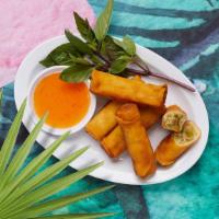 Vegan Vegetable Spring Roll · Cabbage, carrots, and glass noodles in a crispy pastry roll. Served with dipping sauce.