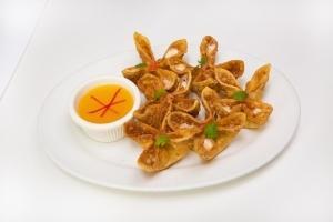 A8 - Cheese Puffs · Crispy wonton skin filled with crabmeat filament and cream cheese. Served with tangy pineapp...