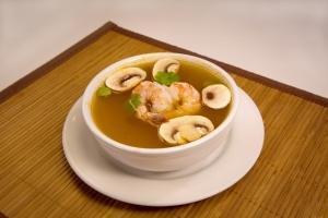 Ss1 - Tom Yum · Your choice of either chicken or seafood with white mushroom and cilantro in a spicy and tan...