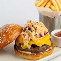 Island Burger · Chargrilled and Covered with Caramelized Onions, Bacon, Melted Cheese, and Pineapple Slaw on...