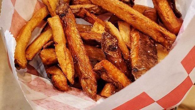 Sweet Potato Fries · Hand-cut sweet potato fries.