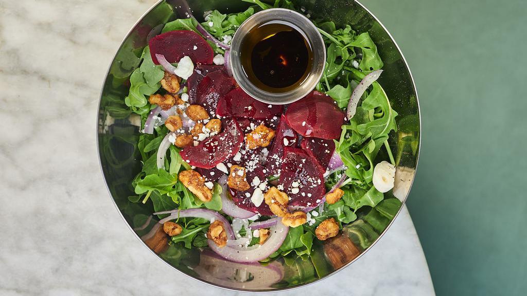 Beet Salad · Arugula, red beets, red onions, goat cheese, walnuts, olive oil, and balsamic vinegar.