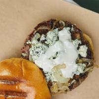 Black & Blue Burger · Our signature 8 oz blend topped with caramelized onions, mushrooms and chunky blue cheese.