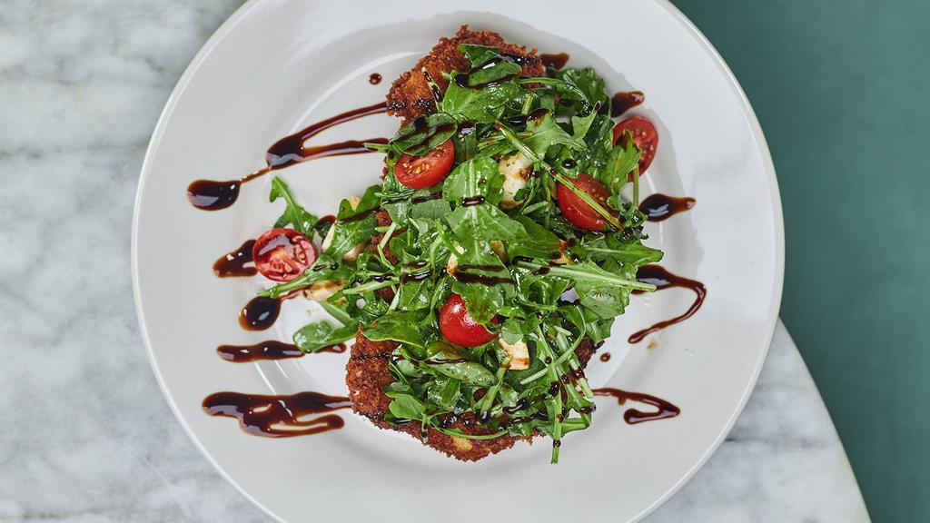 Panko Breaded Chicken Breast · Oven-baked panko chicken topped with fresh arugula, cherry tomatoes, fresh mozzarella, olive oil, balsamic vinegar and drizzled balsamic glaze.