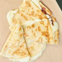 Quesadilla · Perfectly toasted flour tortilla with extra melted mozzarella cheese.