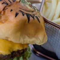 Cheeseburger · 6 ounces of Angus Meat along with American cheese, lettuce, tomatoes, onions, pickles, speci...