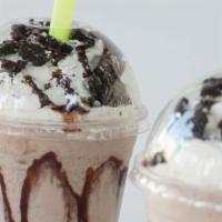 Oreo Milkshake · 16oz of Vanilla ice cream blended with oreo, topped with whipped cream, oreo, and chocolate ...