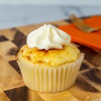 Creme Brûlée  · Vanilla Cake cored filled and topped with Crème Brûlée cream and Torched Sugar.
