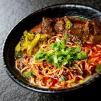 Szechuan Beef Noodle Soup · Beef brisket, tomatoes, home made signature thin noodle, beef broth, Szechuan chili, pickled...