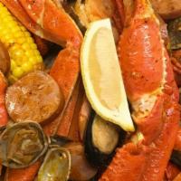 Seafood Boils (1/2 Lb) · Your fresh catch is boiled in our secret spices, then blended with one of our crafty crab si...