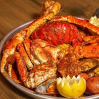 Lobster Special · 1 lobster tail, 1 cluster of snow crab, 1/2 lb. of headless shrimp, 1/4 lb. of sausage (or 2...