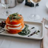 Caprese Salad · Sliced tomato, fresh mozzarella & Kalamata olives, seasonned w/pesto, extra virgin olive oil...