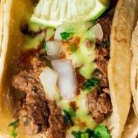 Traffic Jam  Tacos (2) · Diced beef, corn tortillas, salsa roja, onion, cilantro & lime