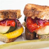 Roasted Vegetable Panini · Zucchini, red onions, tomatoes, red peppers, and yellow squash on ciabatta bread with chevre...