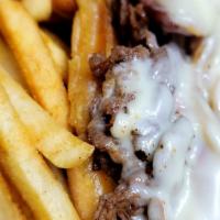 Philly Cheessteak · Enjoy this authentic Philly cheesesteak made with the finest beef, chopped with hot peppers,...