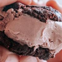 Triple Chocolate Ice Cream Sandwich · Create your own! Choose your favorite ice cream flavor, dipping sauce, and toppings - made w...