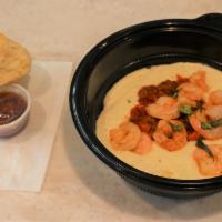 Shrimp And Grits Entrée · Creamy dreamy white cheddar cheese grits topped with blackened shrimp, roasted red pepper to...
