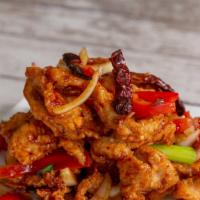 Cashew Nut Chicken · Mild. Crispy chicken sautéed with cashew nuts, bell peppers, onions and roasted peppers.