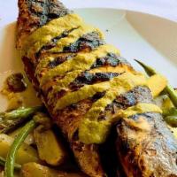 Branzino Di Salo · Grilled Mediterranean Sea Bass with extra virgin olive oil poached fingerling potatoes and g...