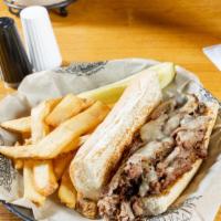 Philly · Melt-in-your-mouth Philly Steak or Chicken smothered with grilled peppers, onions, and mushr...