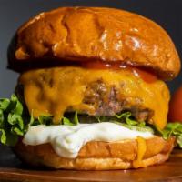 The Cheese Burger · Seasoned half-pound angus patty perfectly cooked to medium, topped with your choice of chees...